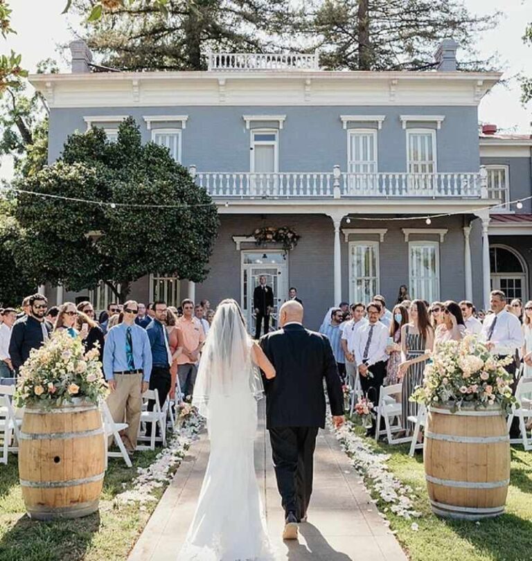 bride walking the aisle at Glenwood Farmhouse